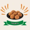 Foto de siete falafels sobre un plato negro